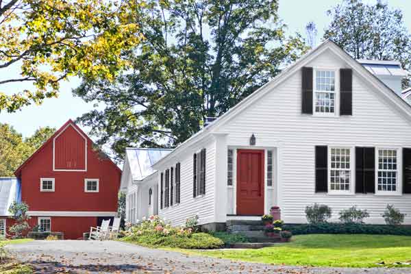exterior of farmhouse and barn remodel after