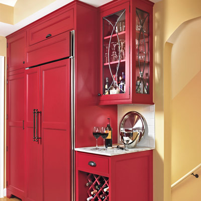 kitchen beverage station red Shaker-style flat-panel cabinets, barware and hidden fridge
