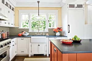 open craftsman kitchen design with island and schoolhouse lights