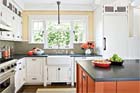 open craftsman kitchen design with island and schoolhouse lights
