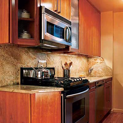wood kitchen with cherry cabinets, mocha granite and red oak floors