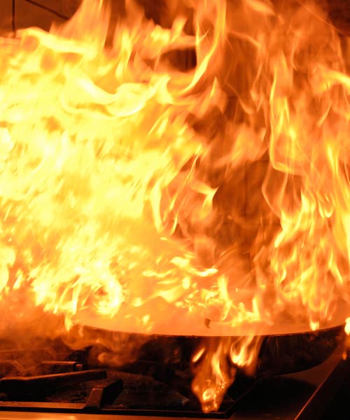 grease fire catching fire on kitchen stove top 