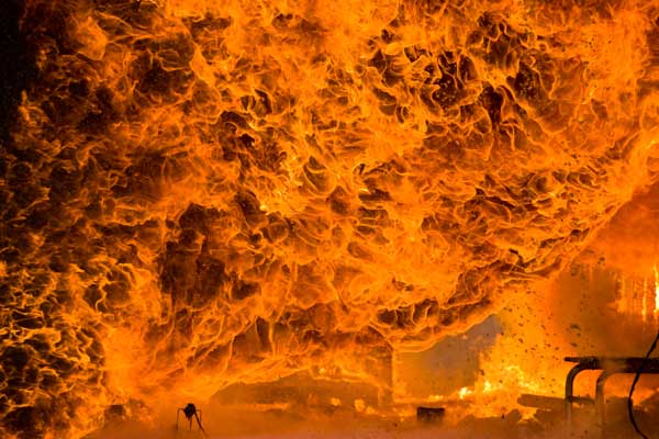room bursting into flames during flashover of house fire