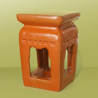 a mandarin-orange square ceramic garden stool