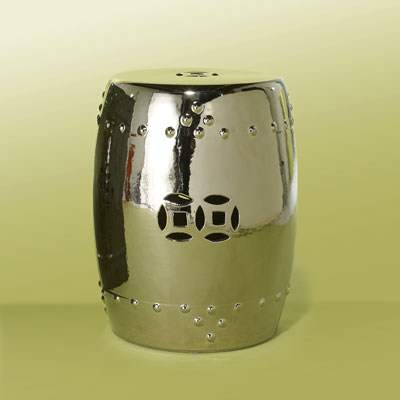 a shiny chrome-glazed ceramic garden stool