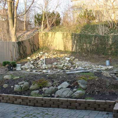 Koi Pond and Waterfalls: Before for the this old house reader remodel yard and garden winners 2012