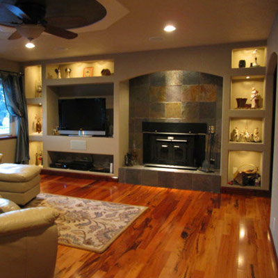 built-in shelves around fireplace in living room