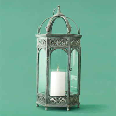 Powder-coated brass with a green-patina finish metal candle lantern