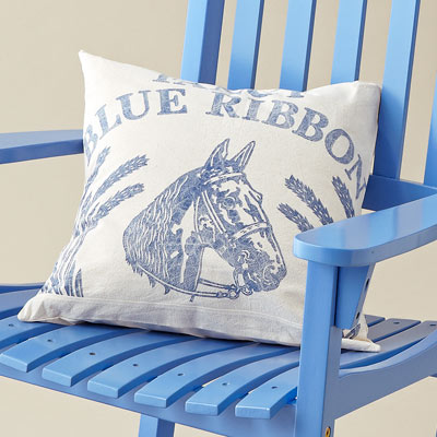grain-sack pillow on blue painted rocking chair 