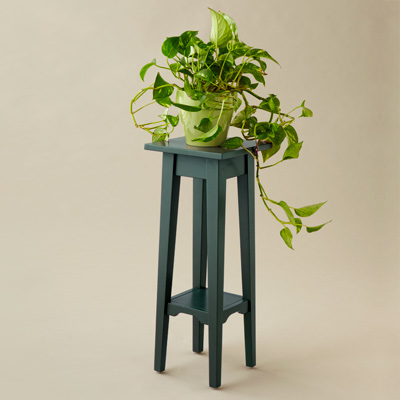 green painted plant stand 