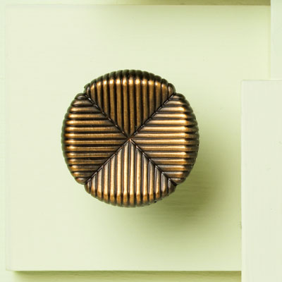 zinc cabinet knob with textured clover design