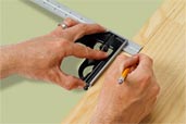 hands using a combination square in a this old house tool test