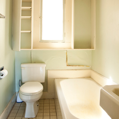 first-floor bathroom before remodel in This Old House TV Essex project house