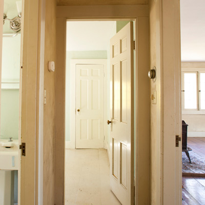 first-floor hallway before remodel in This Old House TV Essex project house