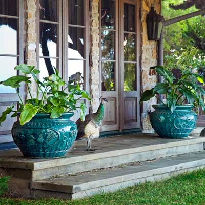 patio doors with blue ceramic pots 