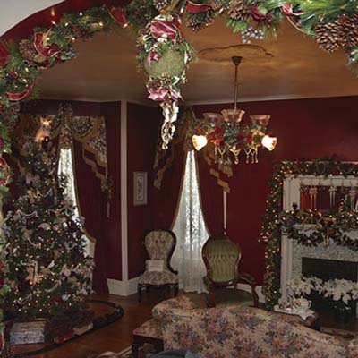 View of a decorated parlor from the foyer