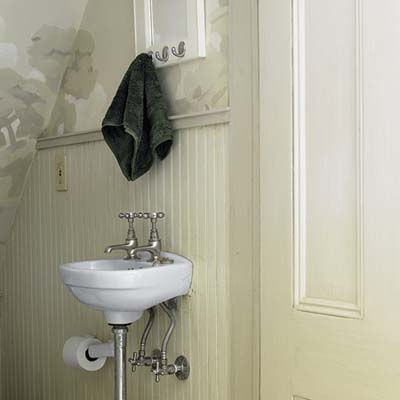 powder room with wainscoting and an old-fashioned basin 