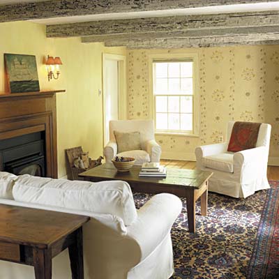 family room with low ceiling and fireplace 