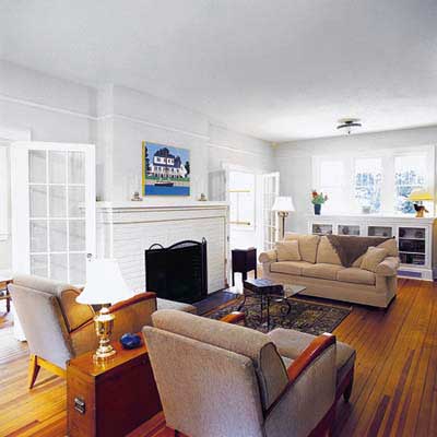 a Craftsman living room with built-ins and French doors