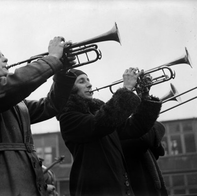 vintage christmas photograph of women playing trumpets