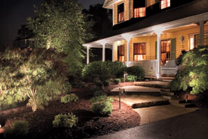 house front yard at night with path lighting