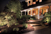 house front yard at night with path lighting