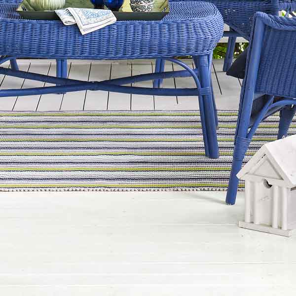 upgrade outdoor room, white porch with bright blue painted wicker furniture and striped rug