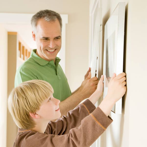 10 uses for weatherstripping young boy hanging wall art on wall