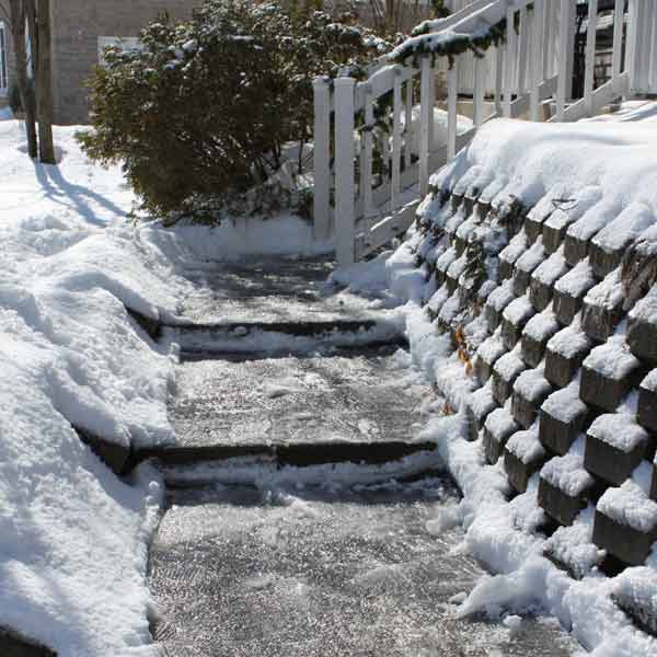 icy stairs leading up to house
