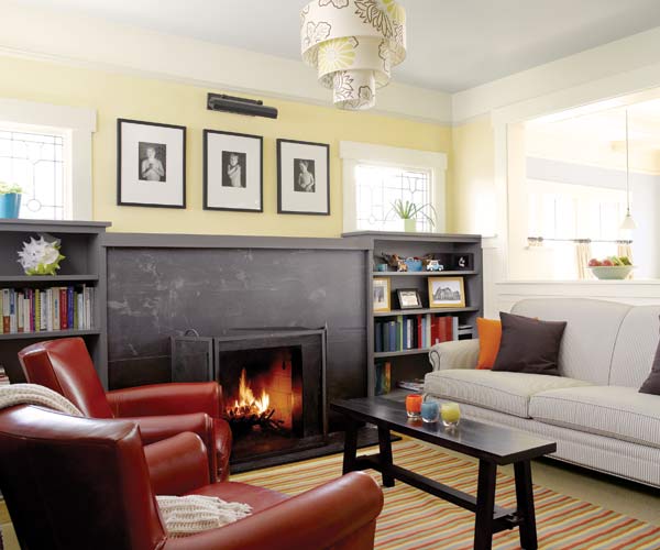 whole house remodel bungalow living room with schist fireplace surround