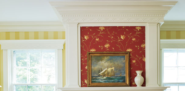 living room with fireplace with dentil molding and Georgian-style crown molding trim