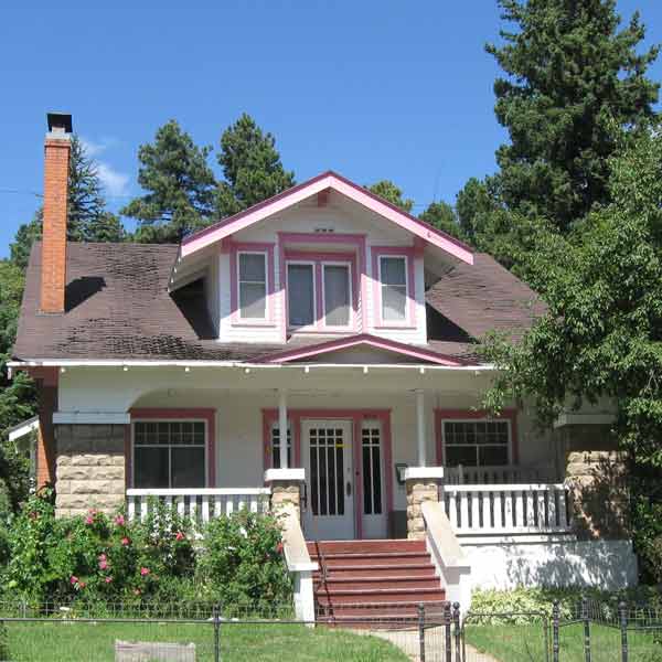 exterior of house with painted concrete block foundation
