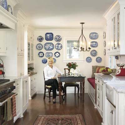 wainscoting adds a semiformal touch  in this remodeled shingle-style cottage
