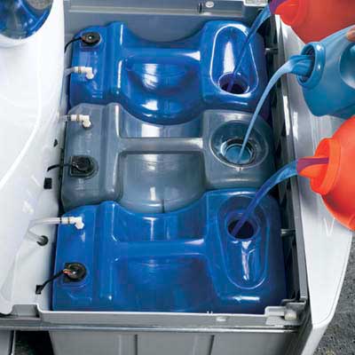 washer and dryer that automatically dispense detergent and fabric softener