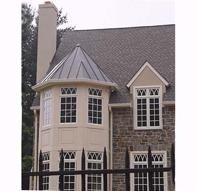 windows in a mcmansion with rhythmic pattern