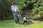 man working on a lawn with a Cultivator made by Stihl
