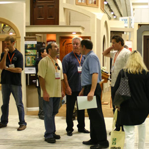 people standing around pacific coast builders conference