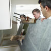 lay the countertop on the cabinets