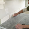 adjust the wall to fit the stone