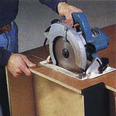 Saw off toekick from main utility cabinet with circle saw