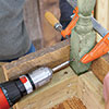 Attaching the spindle legs to the apron's front