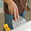 spread a bead of joint compound the length of the molding