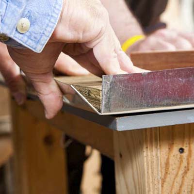 wrap the plywood in metal