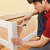 attaching the panel molding to the mudroom bench