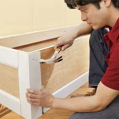 attaching the panel molding to the mudroom bench