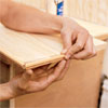 attaching the trim to the mudroom bench seat lid