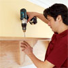 securing the shelf brackets on the mudroom bench