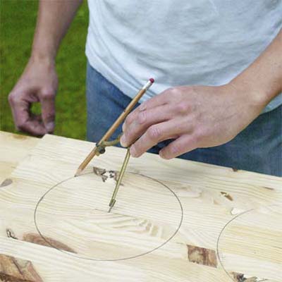 this old house editor mark powers marking the dish holes with a compass