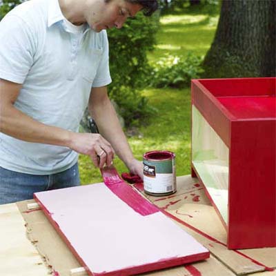 this old house editor mark powers painting the wooden box red both inside and out