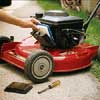 Change the air filter and clear the cooling fins of your lawn mower